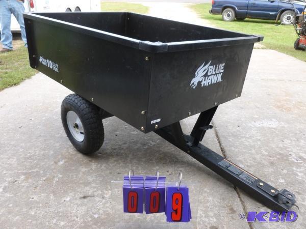 lot 9 image: Ten cubic foot steel lawn dump cart. Blue haw...
