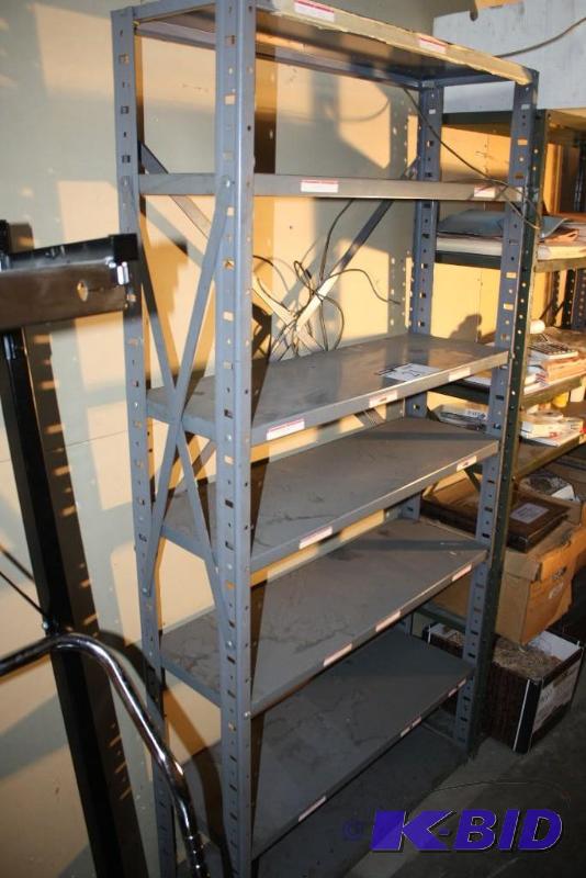 lot 21 image: Gray metal shelf 6 adjustable shelves. 36&qu...