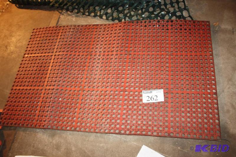 lot 262 image: Rubber mat with slip grip holes red....