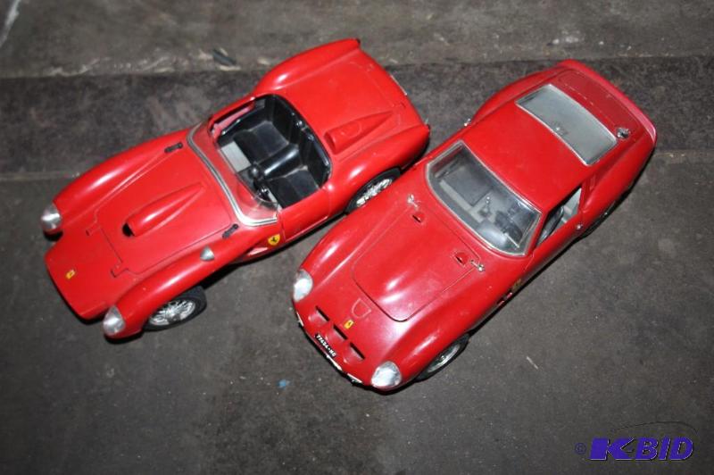 lot 301 image: Lot of (2) toy Ferrari sports cars red....