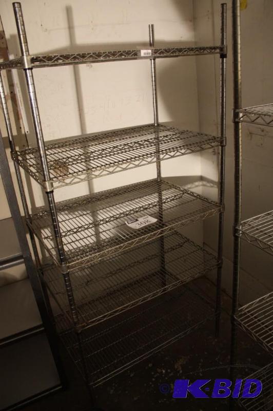 lot 308 image: Metal shelving unit 5 grate shelves adjusta...