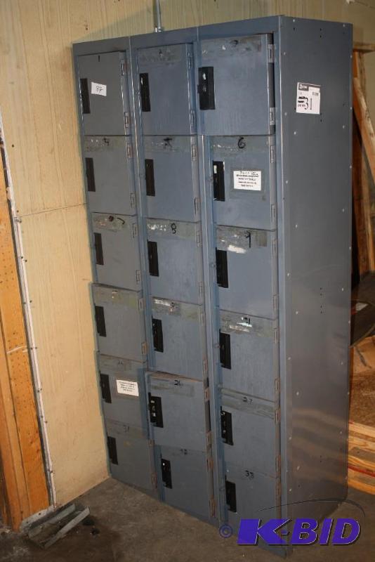 lot 31 image: Metal locker unit 33 individual lockers with...