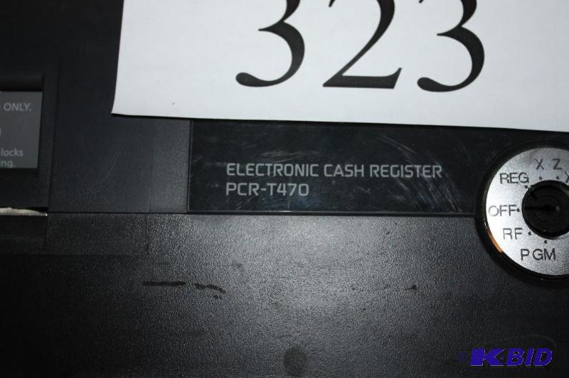 lot 323 image: Casio Electronic Cash Register Model PCR-T47...