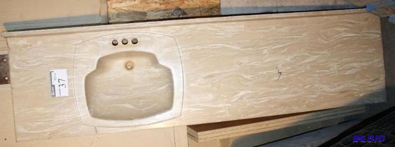 lot 37 image: Countertop with sink plastic white and beig...