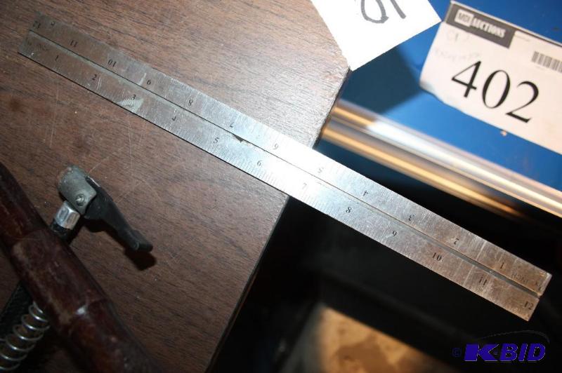 lot 398 image: Lot of (2) metal rulers. 12"...