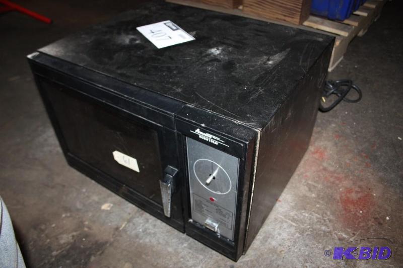 lot 407 image: Amana Microwave. Black. NSF Certified, Missin...