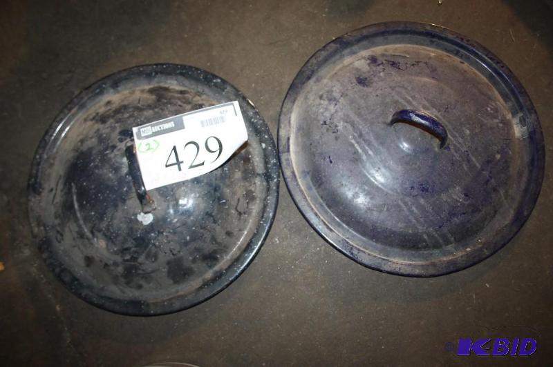 lot 429 image: Lot of (2) black stock pot lids with handles....