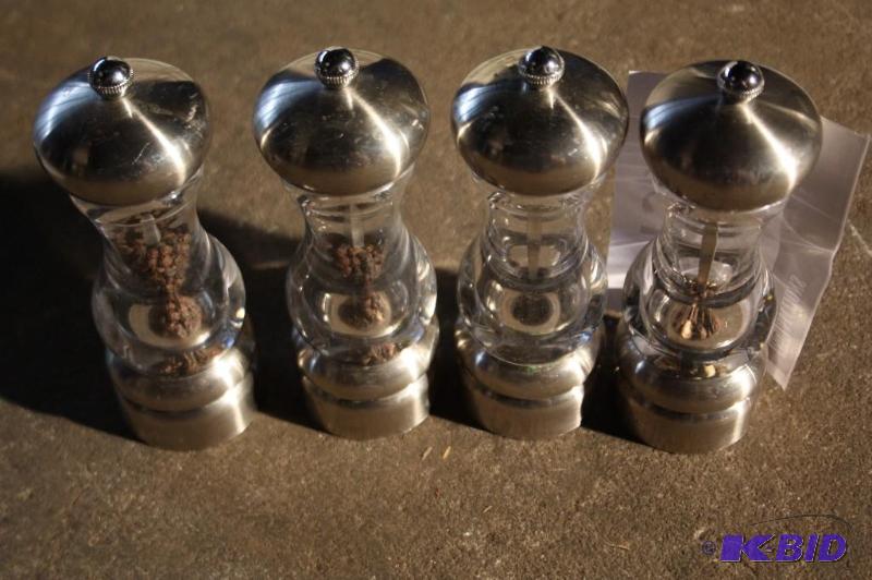 lot 439 image: Lot of (4) metal and glass pepper grinders....