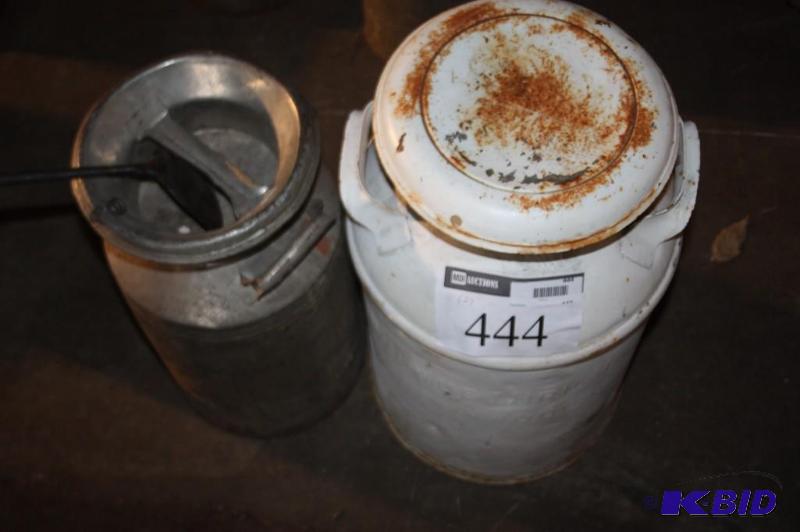 lot 444 image: Lot of (2) milk jugs with lids....