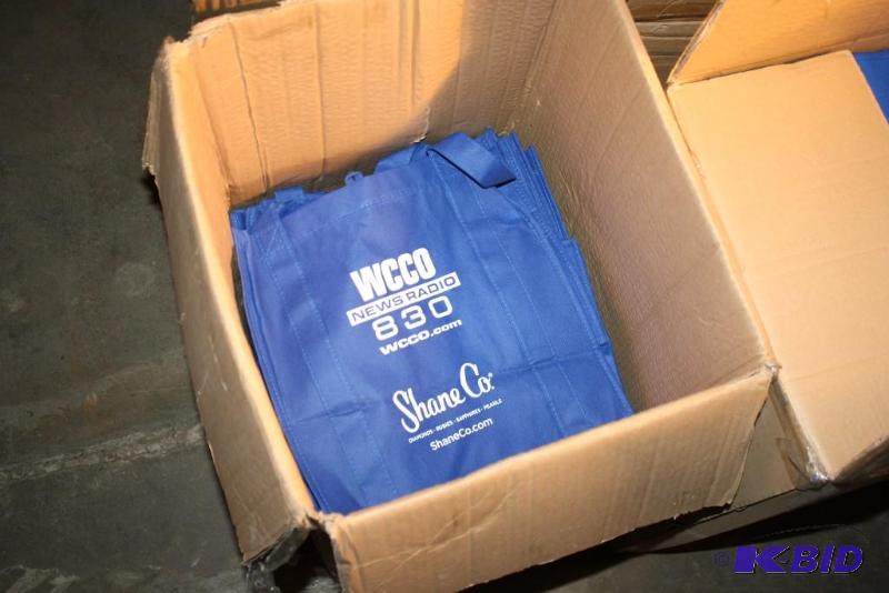 lot 45 image: Box lot of (4) Includes WCCO 830 tote bags. ...