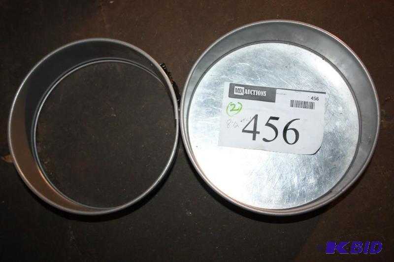 lot 456 image: Lot of (2) metal round baking tin and insert....