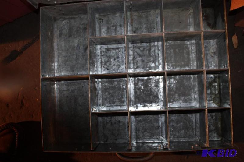 lot 480 image: Metal shelving unit with 18 compartments....
