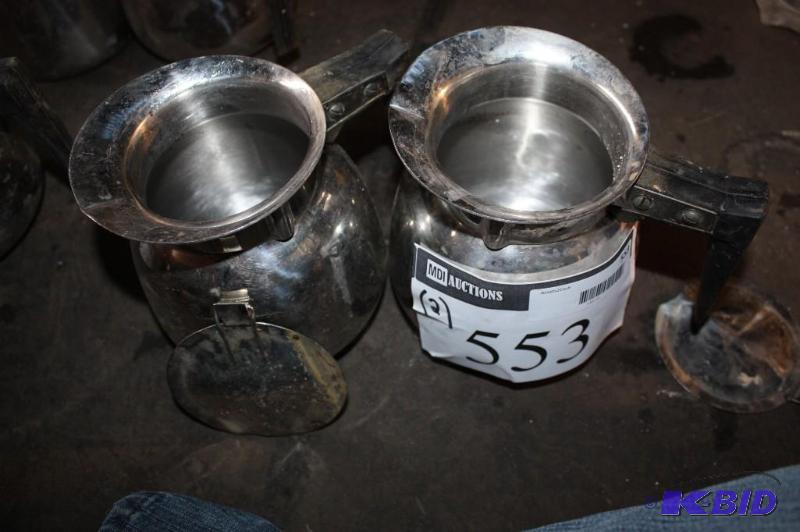 lot 553 image: Lot of (2) metal coffee pots for serving....