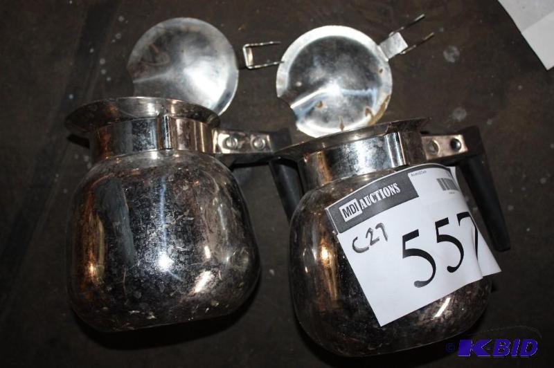 lot 557 image: Lot of (2) metal coffee pots for serving....