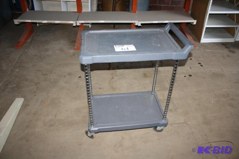 lot 64 image: Plastic push cart. 17" x 29" x 29&q...