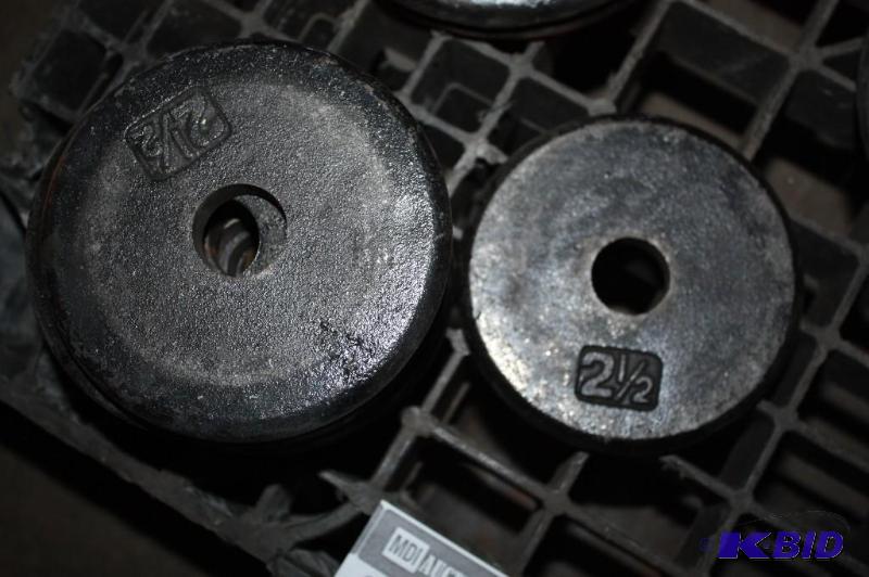 lot 690 image: Lot of (7) 2 12# Barbell Weights...
