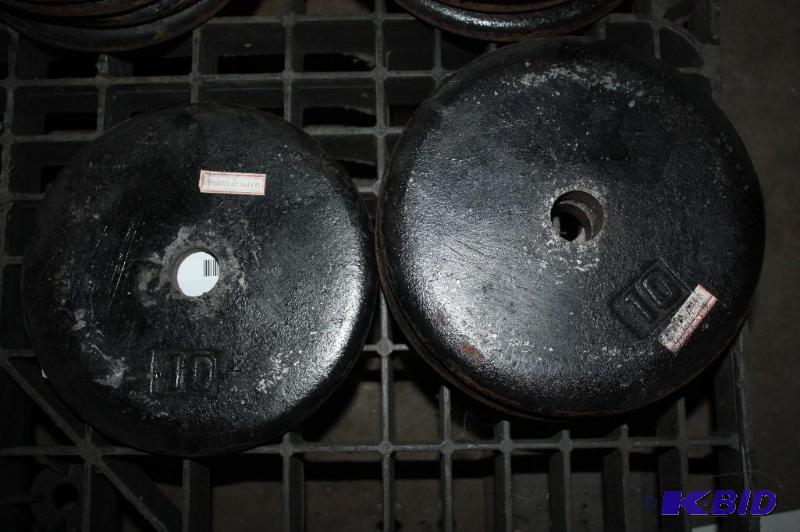 lot 694 image: Lot of (4) barbell weights....
