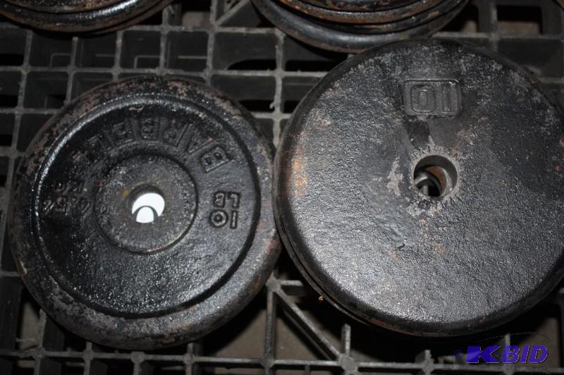 lot 696 image: Lot of (5) barbell weights....