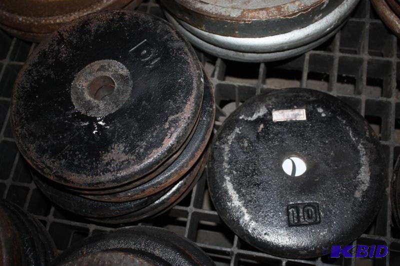 lot 704 image: Lot of (7) barbell weights. #10...