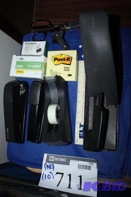 lot 711 image: Lot of (10) office supplies including tape ro...