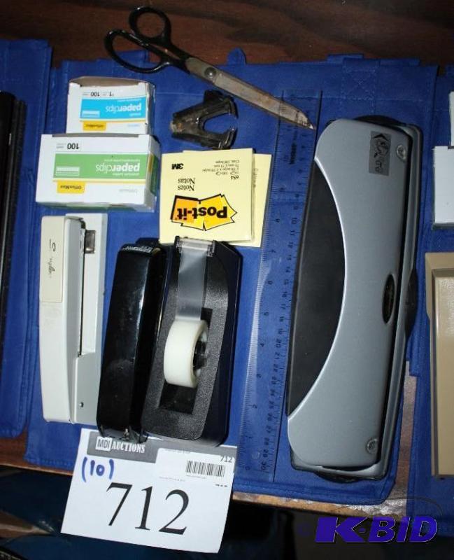 lot 712 image: Lot of (10) office supplies including tape ro...