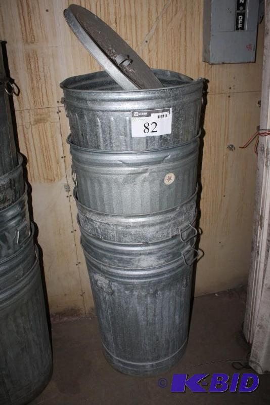 lot 82 image: Lot of (5) 30-gal metal trash cans....