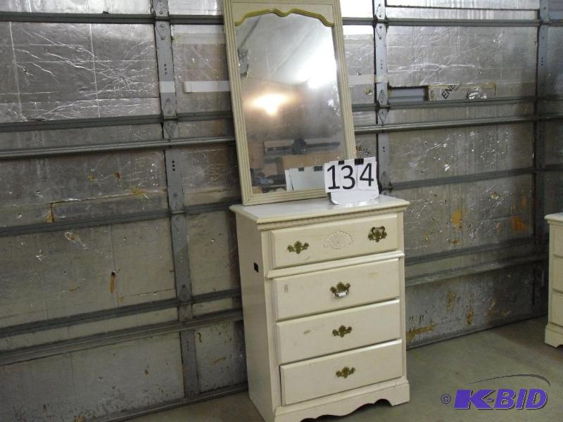 lot 134 image: 4 Drawer Dresser with Mirror. Has some sticke...