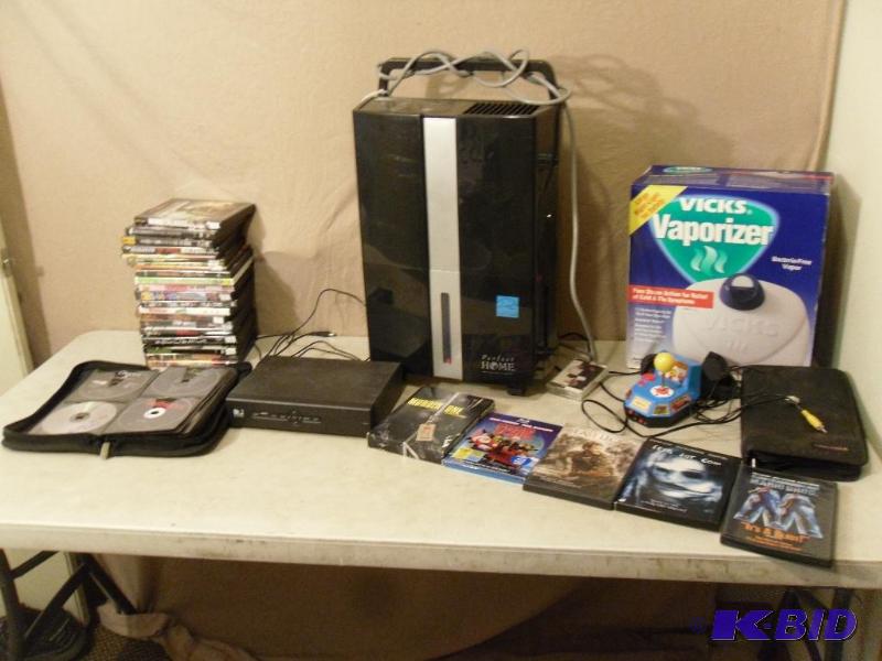 lot 154 image: DVDs (most dvds from cases are in the bookl...