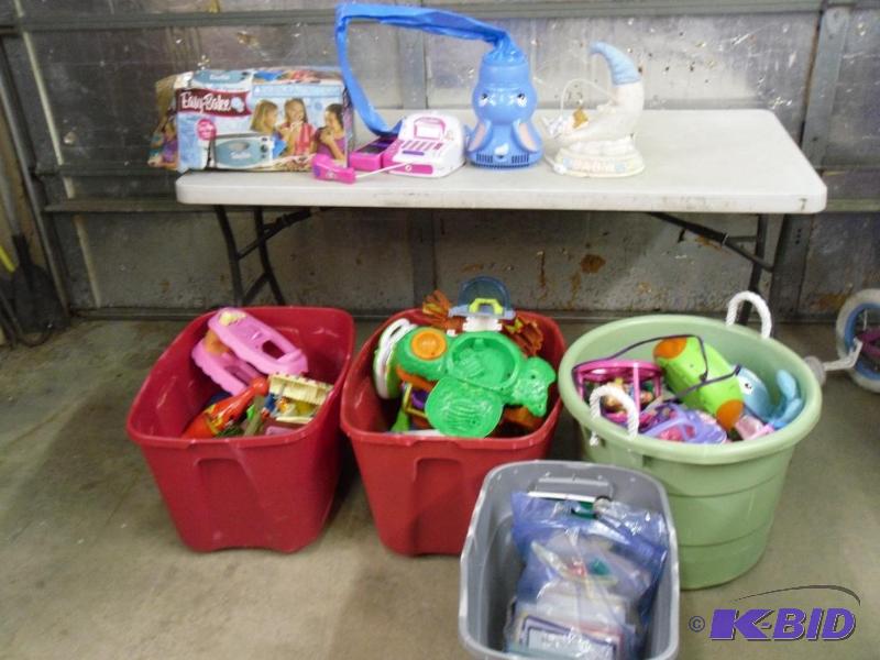 lot 188 image: 4 Totes (no lids) FULL of Assorted Toys. Easy...