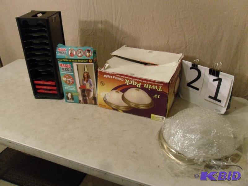 lot 21 image: Magic Mesh Door Screen, One New Light Fixture...