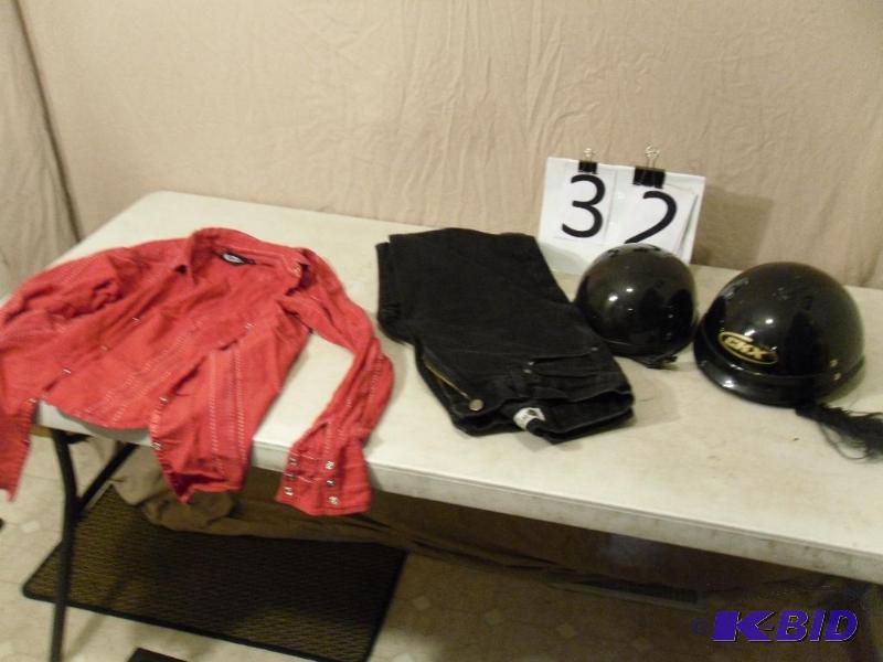 lot 32 image: Lot of 2 Motorcycle Helmets. One has torn str...