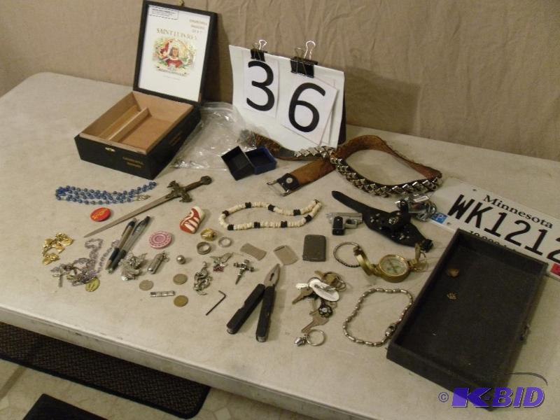lot 36 image: Compass, License Plate, Charms, Belt, Wood Ci...