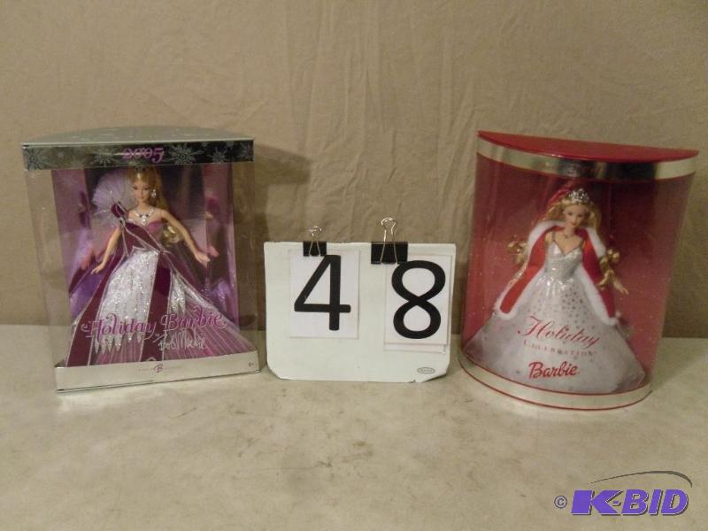 lot 48 image: 2 Collectible Holiday Barbies. 2001 and 2005....