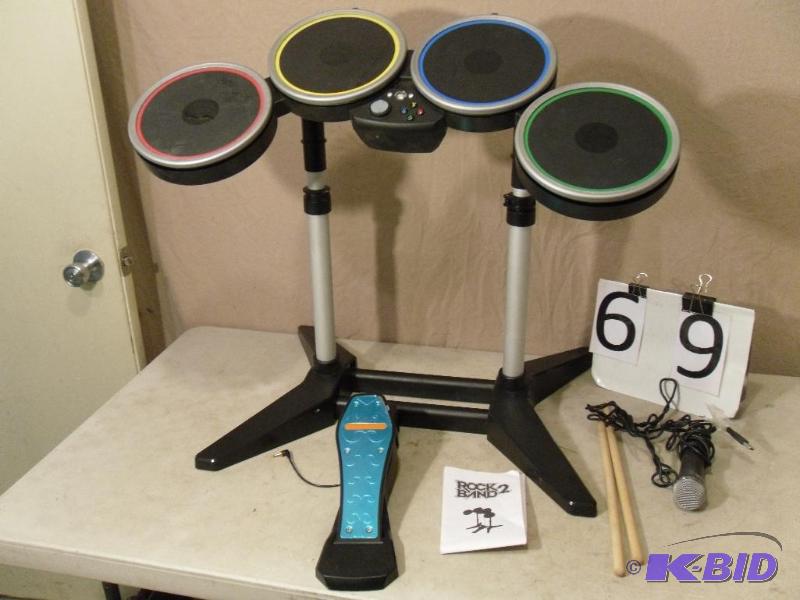 lot 69 image: Rock Band XBox 360 Drums and Microphone. Unte...