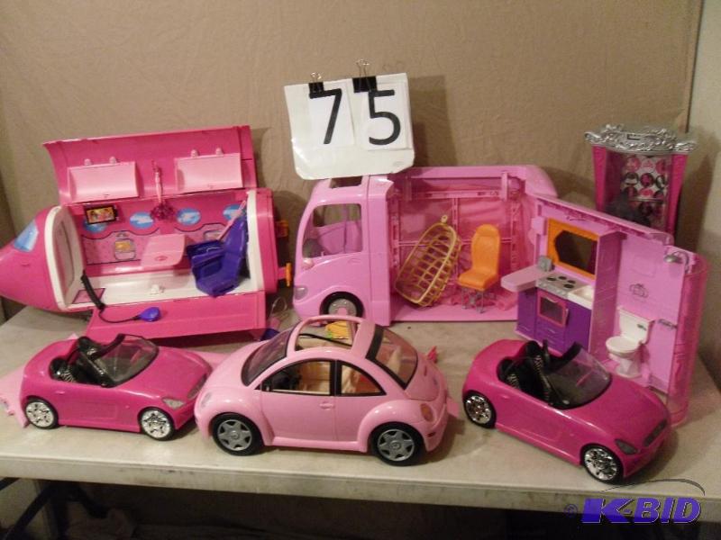 lot 75 image: Barbie Plane, RV, Closet, and 3 Cars. Needs l...