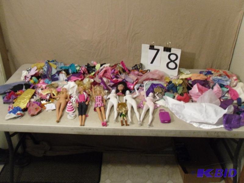 lot 78 image: Lot of Barbies, Barbie Clothes, and Accessori...