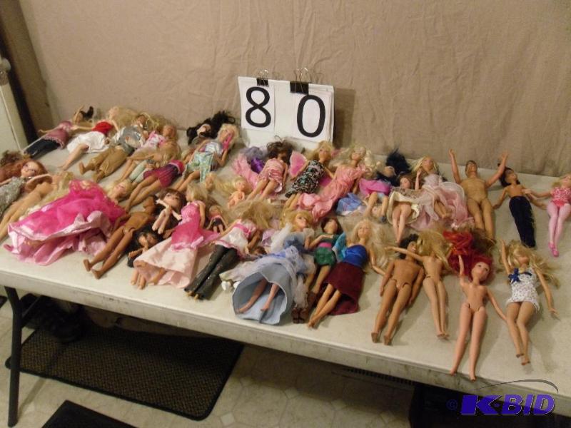 lot 80 image: Lot of Barbie, Ken, and Bratz Dolls....