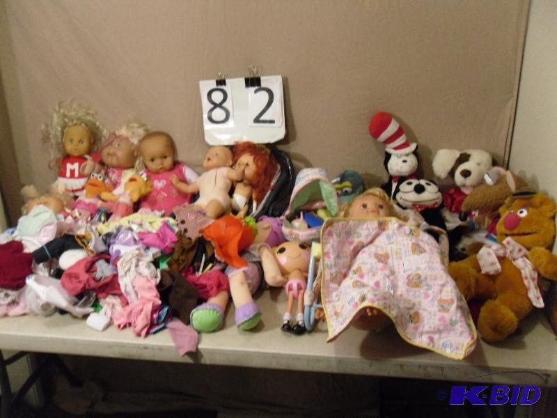lot 82 image: Baby Dolls, Some American Girl Doll Clothes, ...
