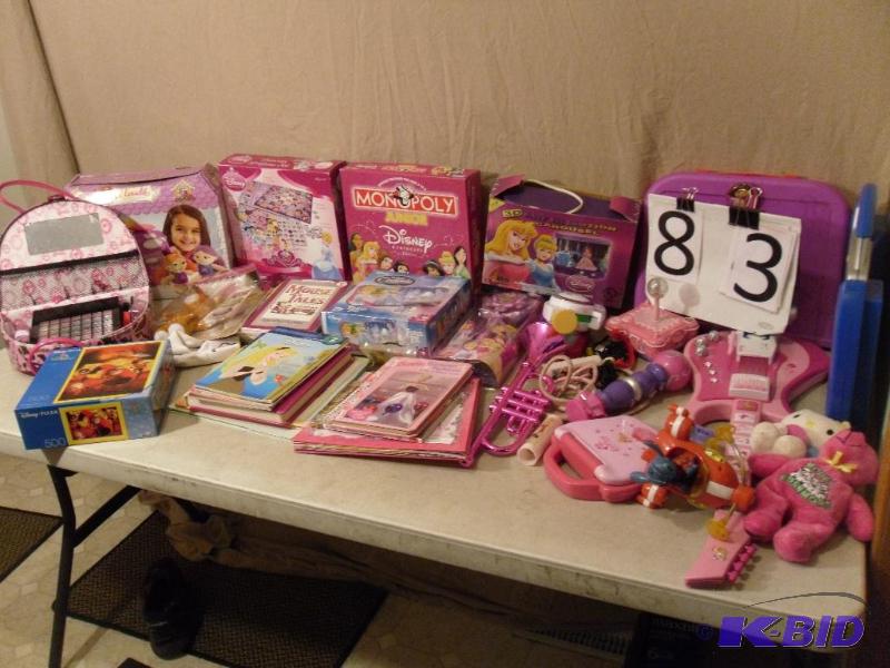 lot 83 image: Large lot of girls toys. Guitar, monopoly, ma...