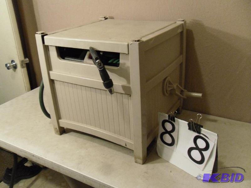 lot 88 image: Suncast Hose Reel Box with Hose and Sprayer. ...