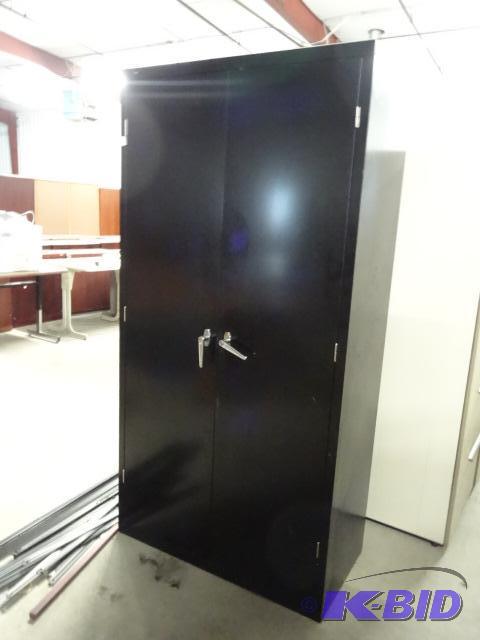 Metal 2 door cabinet. 36 x 18 x 72...