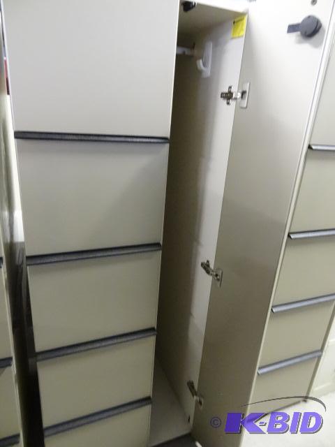 Laminate personal cabinet with 4 file drawers...