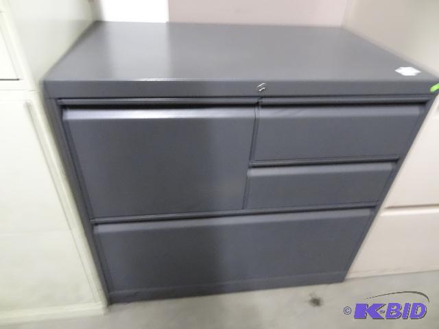 Metal cabinet with lateral drawer and 3 drawe...