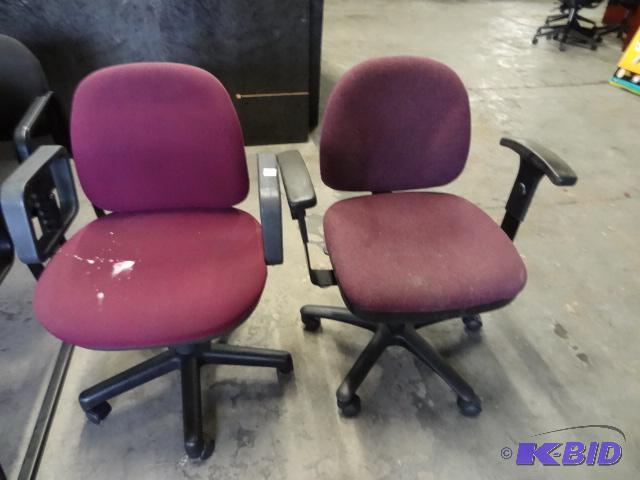 2 Office Chairs on Wheels. Need Cleaning...