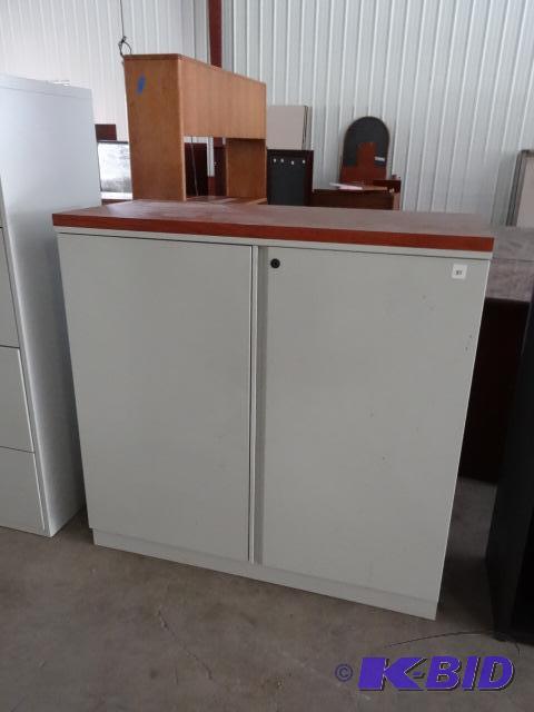 2 Door Metal Cabinet. 2 Shelves, Laminate Top...