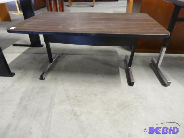 48 x 30 metal framed table. Adjustable height...