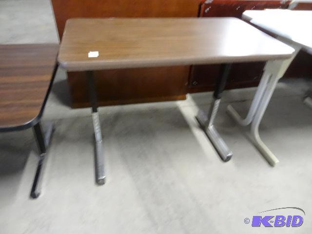 Adjsutable height table. 36 x 21...