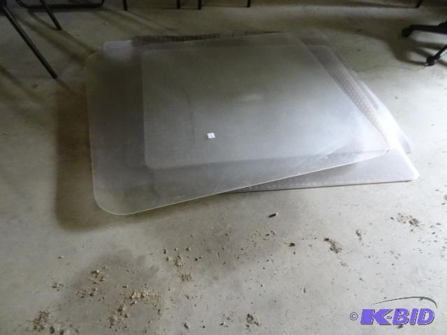 Pile of different sized floor mats...