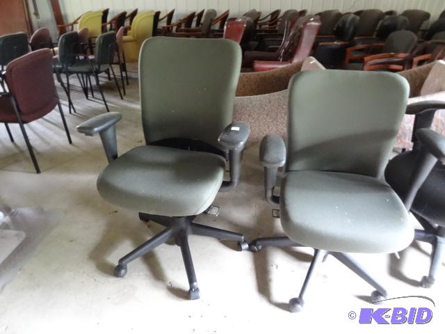 2 matching office chairs on wheels...