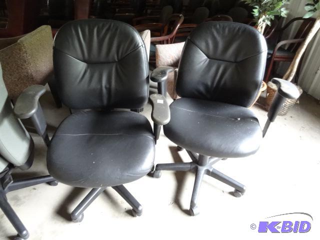 2 matching office chairs on wheels...